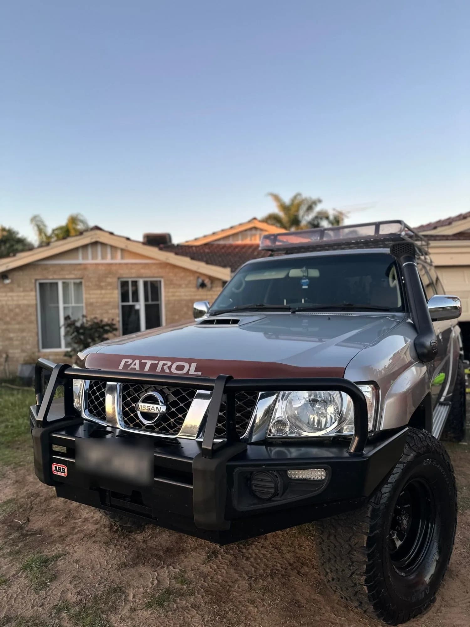 The front of the Nissan Patrol after detailing, clean and shining